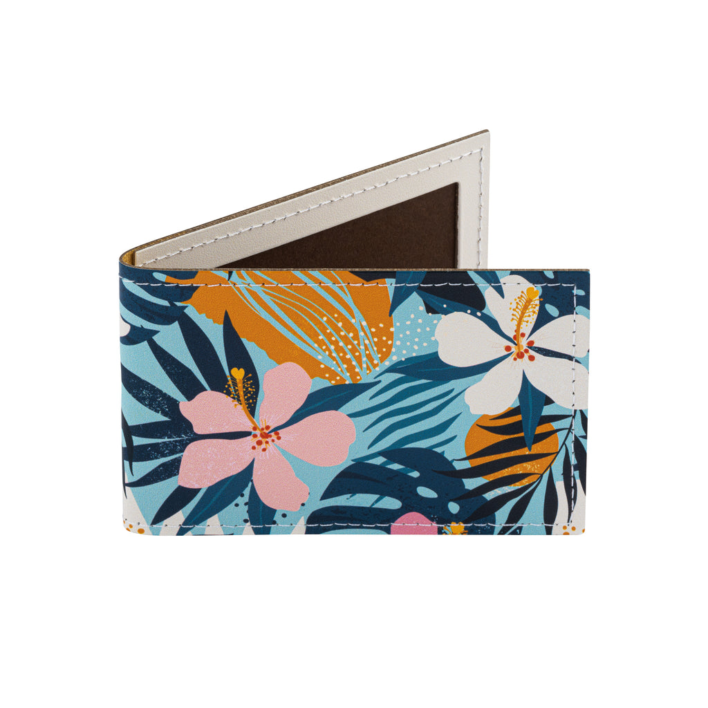Recycled leather travel card holder featuring a tropical floral print pattern, standing upright, on a white background.