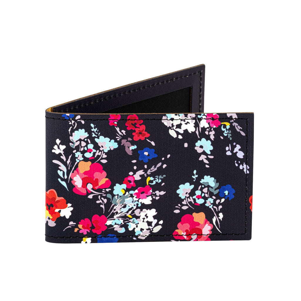Recycled Leather Travel Card Holder featuring a dark blue floral print pattern,  standing, on a white background