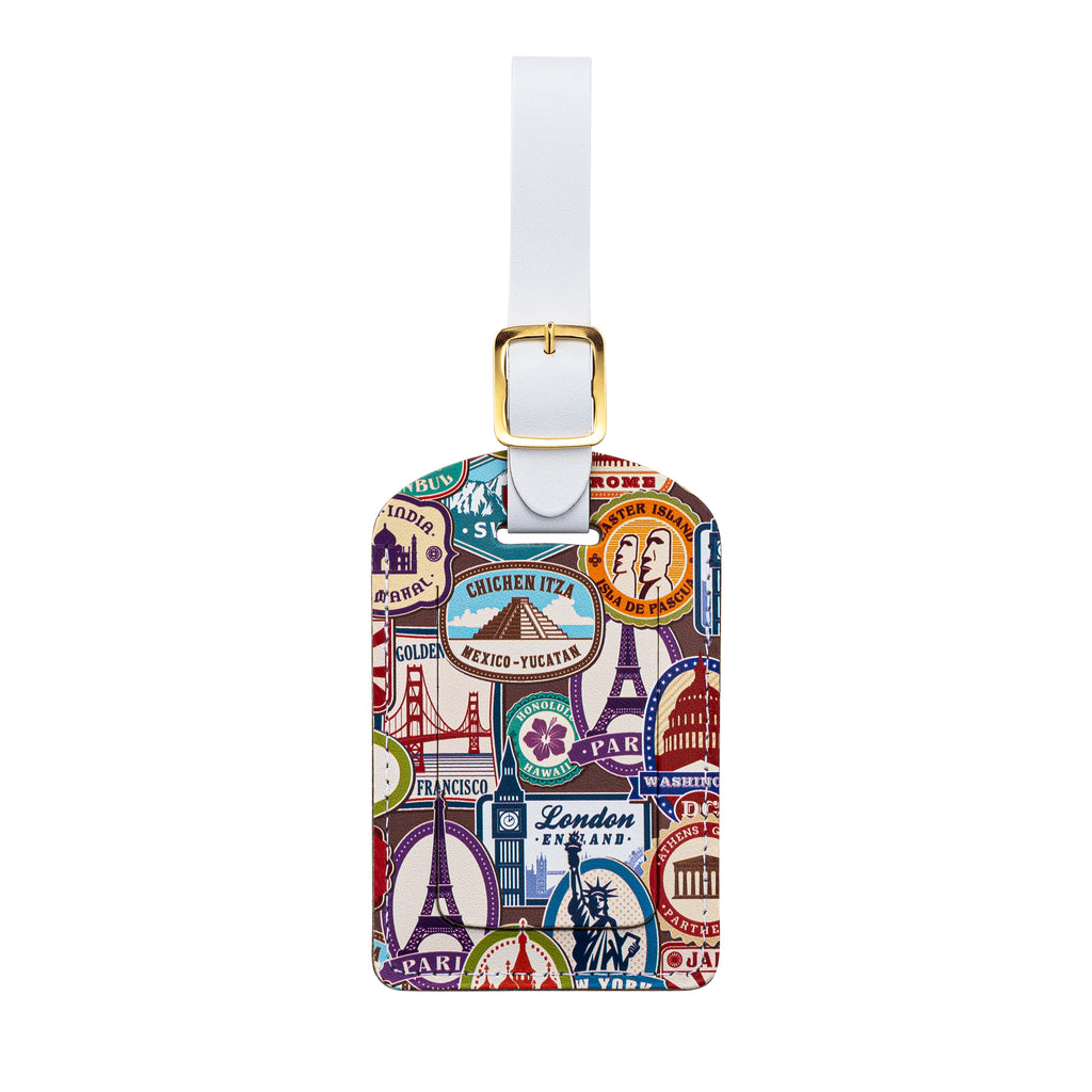 Recycled Leather Luggage Tag featuring travel themed print, with flap covering personal details card, with a white strap finished with a sleek gold-plated buckle to attach to luggage, on a white background.