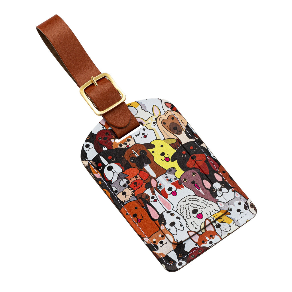Recycled Leather Luggage Tag featuring dog themed print pattern, with flap covering personal details card, with a brown strap finished with a sleek gold-plated buckle to attach to luggage, on a white background, lying flat, angled left.