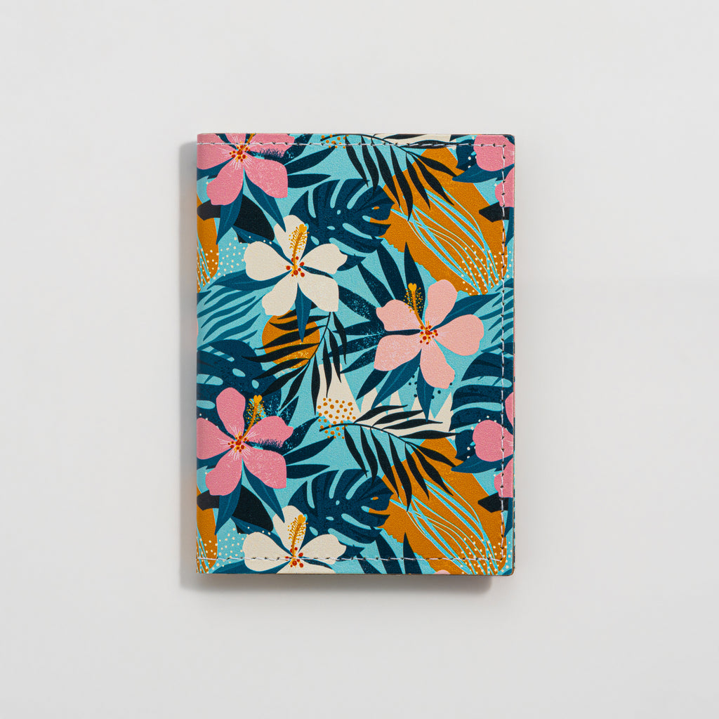 Recycled Leather Folding Wallet Card Holder featuring Tropical Floral Print, closed, on a white background.